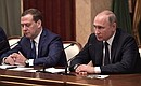 Vladimir Putin held a traditional meeting with Government members ahead of the New Year. With Prime Minister Dmitry Medvedev.