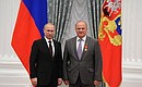 Presenting Russian Federation state decorations. The Order of Alexander Nevsky is awarded to State Duma Deputy and State Duma Committee on Science and High Technology Gennady Zyuganov.
