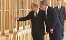 President Putin with US President George Bush during a visit to St Petersburg State University.