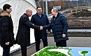 Vladimir Putin examines the site and models of construction projects at the Volzhskoye More tourist and recreation cluster. With Presidential Plenipotentiary Envoy to the Central Federal District Igor Shchegolev (left), Tver Region Governor Igor Rudenya and Vasta Discovery General Director Sergei Bachin. Photo: Maxim Blinov, RIA Novosti