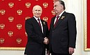 Before the parade, Vladimir Putin welcomed the heads of foreign states who had arrived in Moscow for the celebrations, in the Heraldic Hall of the Kremlin. With President of Tajikistan Emomali Rahmon. Photo: Vladimir Smirnov, TASS