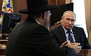 В ходе встречи с главным раввином России Берлом Лазаром и президентом Федерации еврейских общин Александром Бородой.