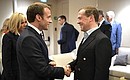 During the interval in the final match of the 2018 World Cup. Prime Minister Dmitry Medvedev, President of France Emmanuel Macron and his wife, Brigitte.