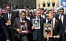 With Prime Minister of Israel Benjamin Netanyahu and President of Serbia Aleksandar Vucic, left, at the Immortal Regiment event.