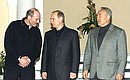 President Putin with Belarusian President Alexander Lukashenko (left) and Kazakhstan\'s President Nursultan Nazarbayev before an informal dinner.