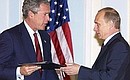 Exchange of instruments of ratification for the Strategic Offensive Reductions Treaty. President Vladimir Putin with President George Bush of the United States.