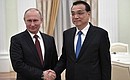 With Premier of the State Council of China Li Keqiang.