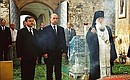 President Putin in the Valdai Iversky Svyatoozersky Monastery of Our Lady during a service for those killed in a terrorist attack in Astrakhan on August 19. Governor of the Novgorod Region Mikhail Prusak and Archbishop Lev of Novgorod and Staraya Russa.