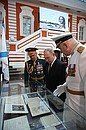With Defence Minister Sergei Shoigu (left) and Commander-in-Chief of the Russian Navy Nikolai Yevmenov at the St Petersburg State History Museum in the Peter and Paul Fortress.