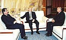 Russian President Vladimir Putin, Uzbek President Islam Karimov and Tajik President Emomali Rakhmonov.