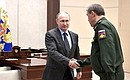 With Chief of the General Staff of Russia’s Armed Forces Valery Gerasimov.