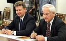 Министр транспорта Максим Соколов (слева) и помощник Президента Андрей Белоусов перед началом совещания о развитии Московского авиационного узла.
