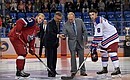 Vladimir Putin performs a ceremonial face-off in the cup’s first match between Loko (Yaroslavl) and Alberta (Canada).