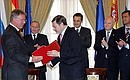 At presence of President Vladimir Putin and Spanish Prime Minister Jose Luis Rodriguez Zapatero Vyacheslav Fetisov, Chief of the Federal Agency for Physical Culture and Sport, and Jaime Lissavetzky-Diaz, Spanish Sports Minister and Head of the Supreme Sports Council of Spain, are signing a Memorandum on cooperating in sport.