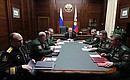 В ходе посещения Национального центра управления обороной Президент встретился с командующими войсками военных округов и Северным флотом.