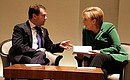 With German Federal Chancellor Angela Merkel.