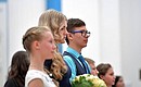 На церемонии вручения паспортов юным гражданам России.