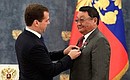 Presenting Russian state decorations to foreign citizens. Zhugderdemidiyn Gurragcha (Mongolia), president of Union of Mongolian Societies for Friendship with CIS Countries, receives the Order of Friendship.
