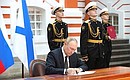 At the ceremony of signing the Executive Order On Approving the Naval Doctrine of the Russian Federation, and the Executive Order On Approving the Russian Navy Regulations.