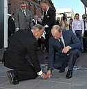 A personalised plate is laid for Vladimir Putin in Turku, Finland, in recognition of his efforts to protect the Baltic Sea.