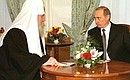 President Putin with Patriarch of Moscow and All Russia Alexy II.