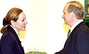 Vladimir Putin with Austrian Foreign Minister and OSCE Chairperson-in-Office Benita Ferrero-Waldner.