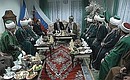 President Putin meeting with Talgat Tadzhuddin, head of the Spiritual Directorate of Muslims of Russia, and top Muslim religious leaders.
