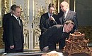 President Vladimir Putin and German Chancellor Gerhard Schroeder visiting the Tsarskoye Selo estate-museum and the Catherine Palace.