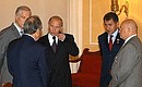 President Putin before the beginning of the United Russia Party\'s Third Congress with members of the Party\'s Supreme Council — (from left to right) Interior Minister Boris Gryzlov, Tatarstan President Mintimer Shaimiyev, Emergency Situations Minister Sergei Shoigu and Moscow Mayor Yury Luzhkov. 
