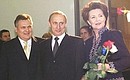 President Putin, Polish President Aleksander Kwasniewski and Mrs Iolanta Kwasniewski at the Warsaw Grand Theater.