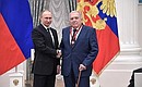 Presentation of state decorations. Vladimir Kharchenko, research director at the Russian Radiology Research Centre, is awarded the Order for Services to the Fatherland, III degree.