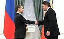 Dmitry Medvedev presents the Order for Services to the Fatherland, IV degree, to Alexei Kasatonov, Merited Sports Master of the USSR.