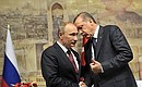 По окончании пресс-конференции по итогам заседания российско-турецкого Совета сотрудничества высшего уровня. С Премьер-министром Турции Реджепом Тайипом Эрдоганом.