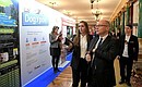 First Deputy Chief of Staff of the Presidential Executive Office Sergei Kiriyenko and Director of the Russian Centre for Civil and Patriotic Education of Children and Young People Ksenia Razuvayeva at an exhibition of volunteer projects before the State Council meeting.