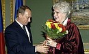 Poet Alla Potapova being awarded the Order of Friendship.