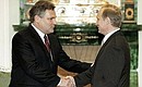 С Президентом Польши Александером Квасьневским.