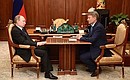 С президентом, председателем правления Сбербанка России Германом Грефом.