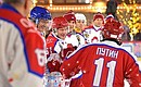 Before a friendly game of the All-Russian Night Hockey League. Vladimir Putin greets the players.