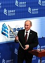 At the Far East Federal University. Vladimir Putin presents the symbolic key to the new campus to the Far East Federal University.