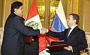 После подписания совместного заявления. С Президентом Перу Аланом Гарсия Пересом.