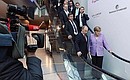 С Федеральным канцлером Германии Ангелой Меркель перед началом встречи с представителями российско-германских деловых кругов.