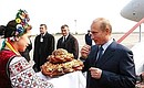 President Putin being welcomed at Zaporozhye Airport.