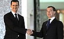 С Президентом Сирии Башаром Асадом перед началом встречи в дворцовом комплексе «Каср аш-Шааб». Фото: Сергей Гунеев, РИА «Новости»