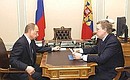 President Putin and Acting Finance Minister Alexei Kudrin.