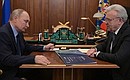 С губернатором Красноярского края Александром Уссом.