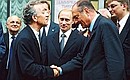 President Putin with his French counterpart, Jacques Chirac, and Russian orchestra conductor Yury Temirkanov outside the St Petersburg Philharmonic.