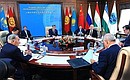 Shanghai Cooperation Organisation summit meeting in narrow format.