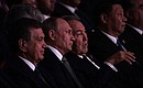 President of Uzbekistan Shavkat Mirziyoyev, Vladimir Putin, President of Kazakhstan Nursultan Nazarbayev, and President of China Xi Jinping (from left to right) at the concert for the meeting of the SCO Heads of State Council.