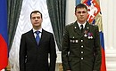 Presenting state decorations. Private Shamil Kolokoltsev received the Order of Courage.