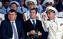 At a naval parade to celebrate Navy Day. With Defence Minister Anatoly Serdyukov (left) and Commander in Chief of the Russian Navy Admiral Vladimir Vysotsky.